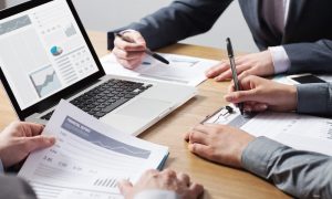 Business Professionals Analyzing Financial Data